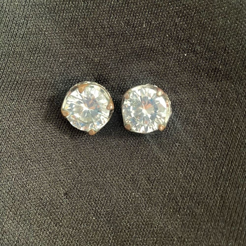 Diamond Stud Earrings.